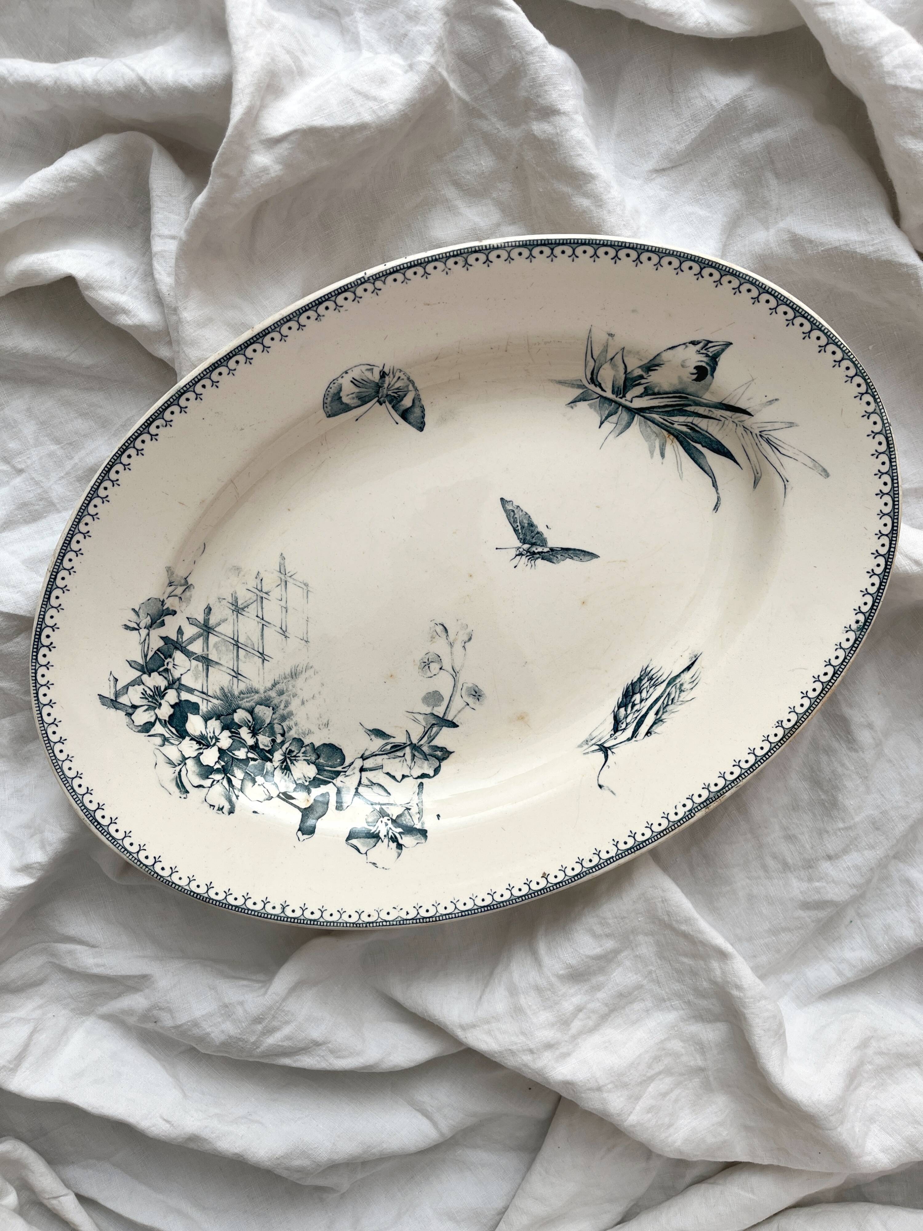 Oval ironstone dish with flowers and birds "Malaga" Petrus Regout