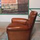 Paire de fauteuils-club en cuir