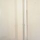 Adjustable metal floor lamp with its vintage smoked ball model from Roger Pradier 1970