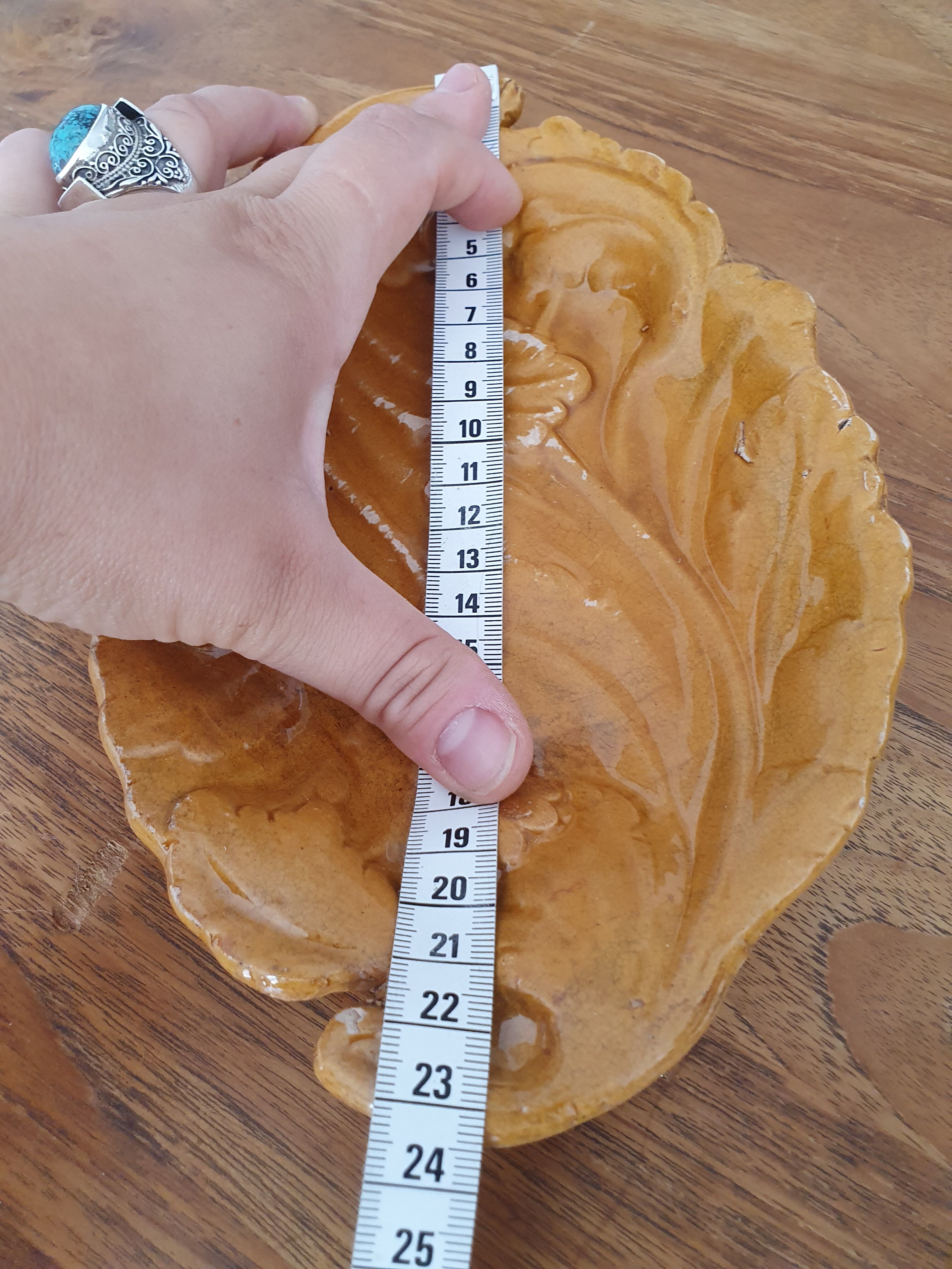 Empty pocket old ceramic sheets enamelled mustard yellow