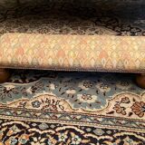 Long rustic footrest on ball feet