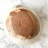 Pair of Asian handmade cups in beige and brown sandstone