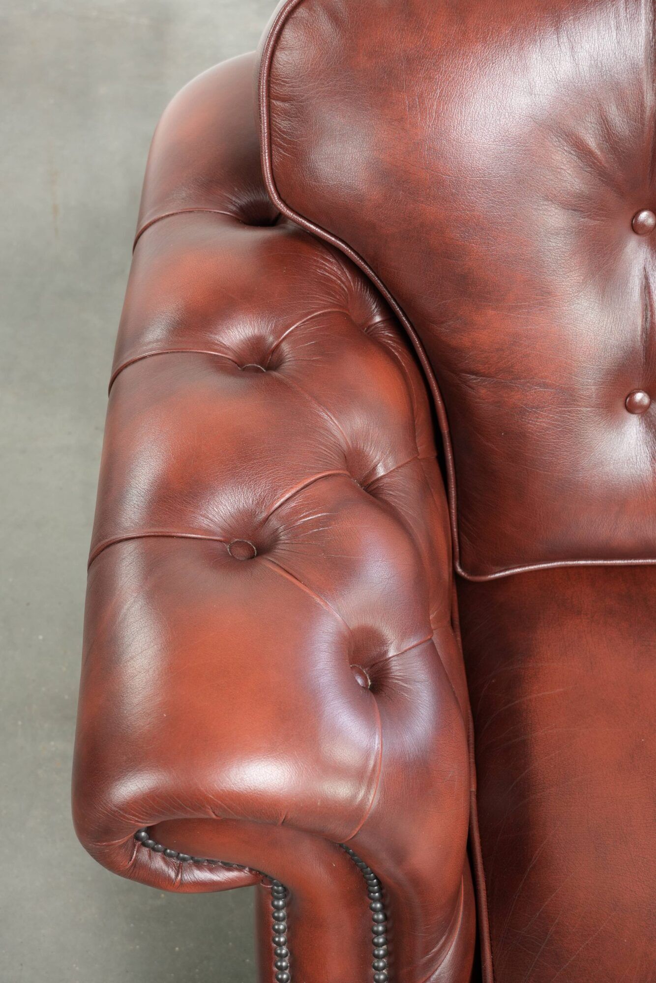 Brown cow leather Chesterfield armchair in a unique design