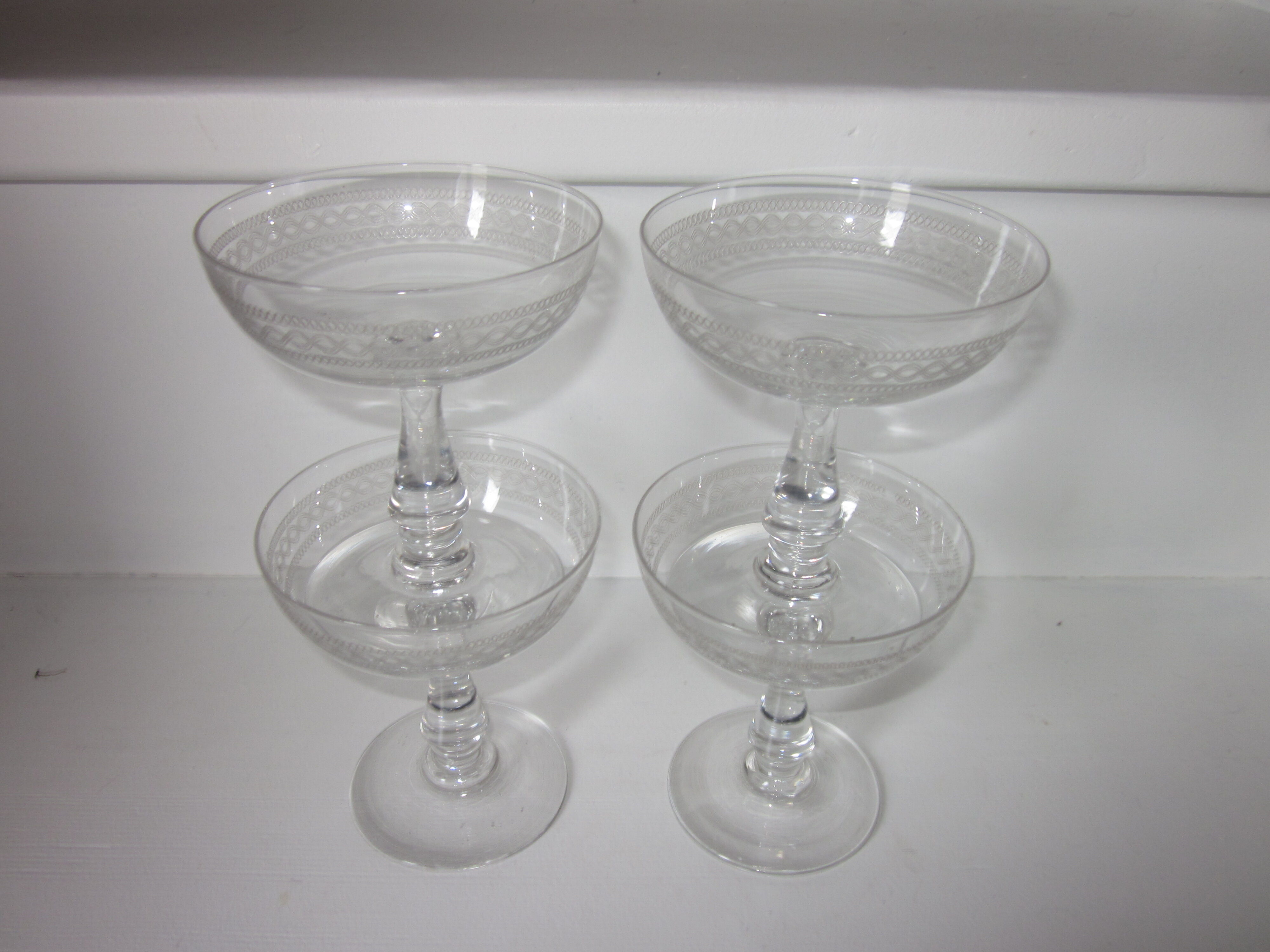 Set of 4 old champagne glasses