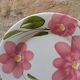 Round serving dish with hand-painted pink flowers in San Marciano ceramic.