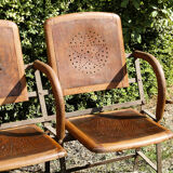 Row of theater folding seats, early twentieth century