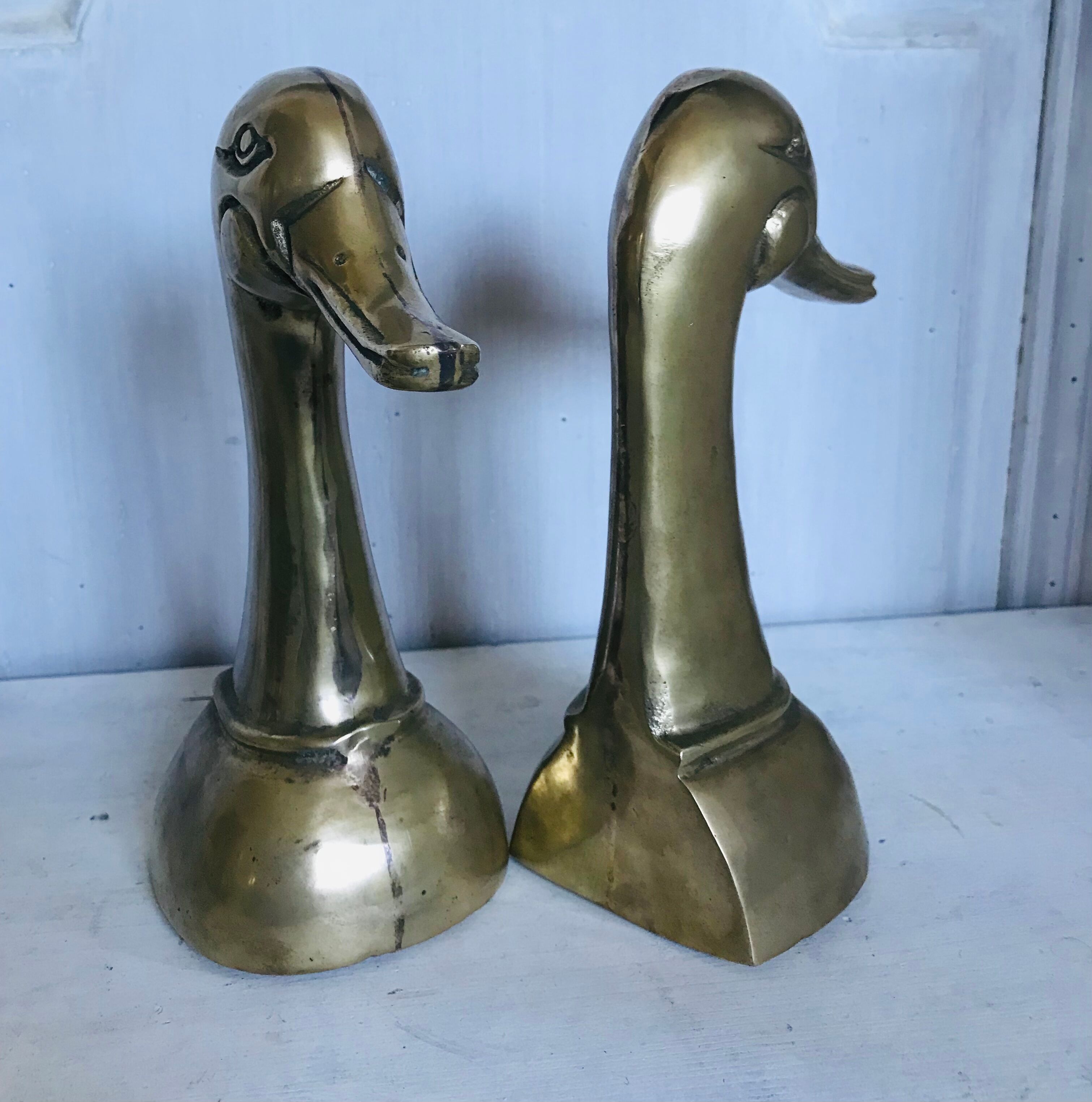 Pair of brass book ends 21cm