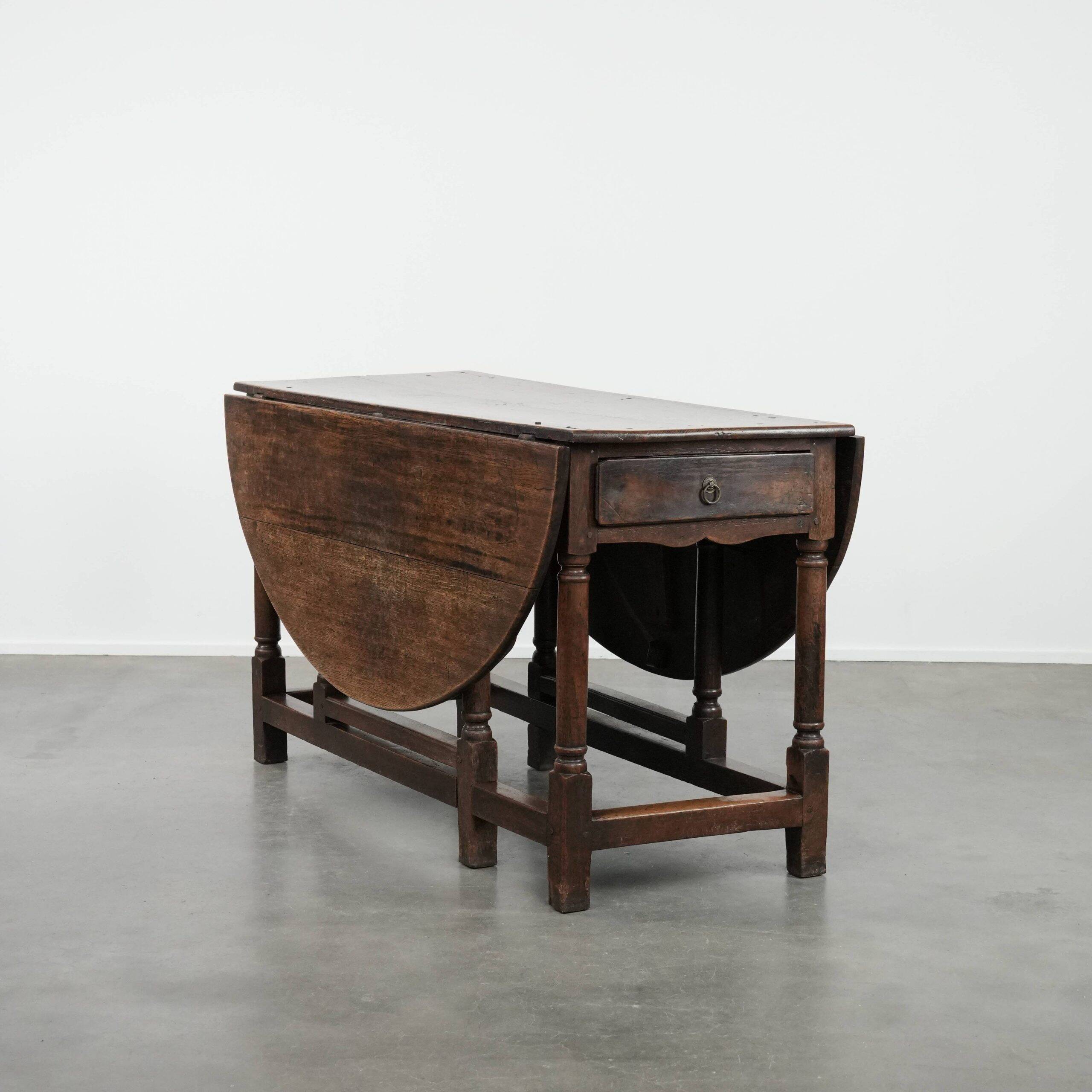 Antique English oak side/dining/gateleg table from the 18th century