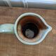 Glazed ceramic pitcher