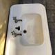 Antique washbasin on ceramic column
