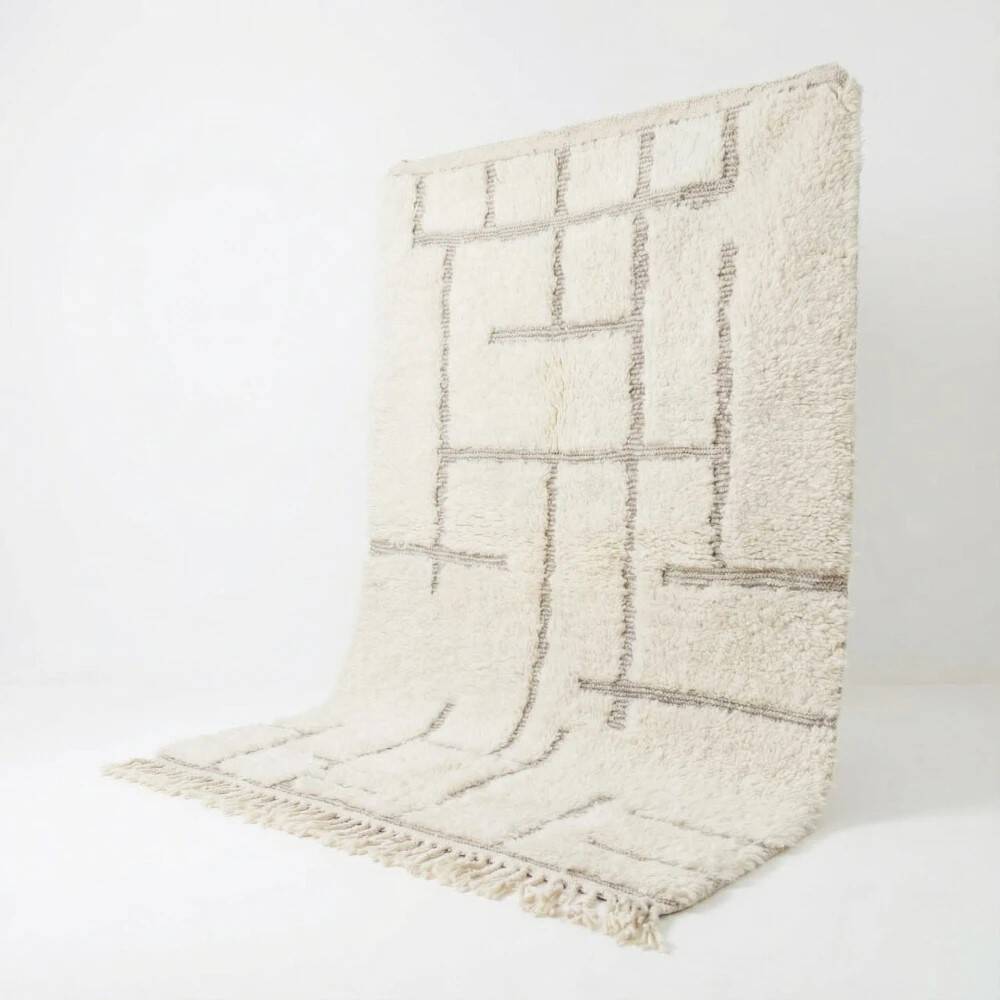 Moroccan rug with black graphic pattern