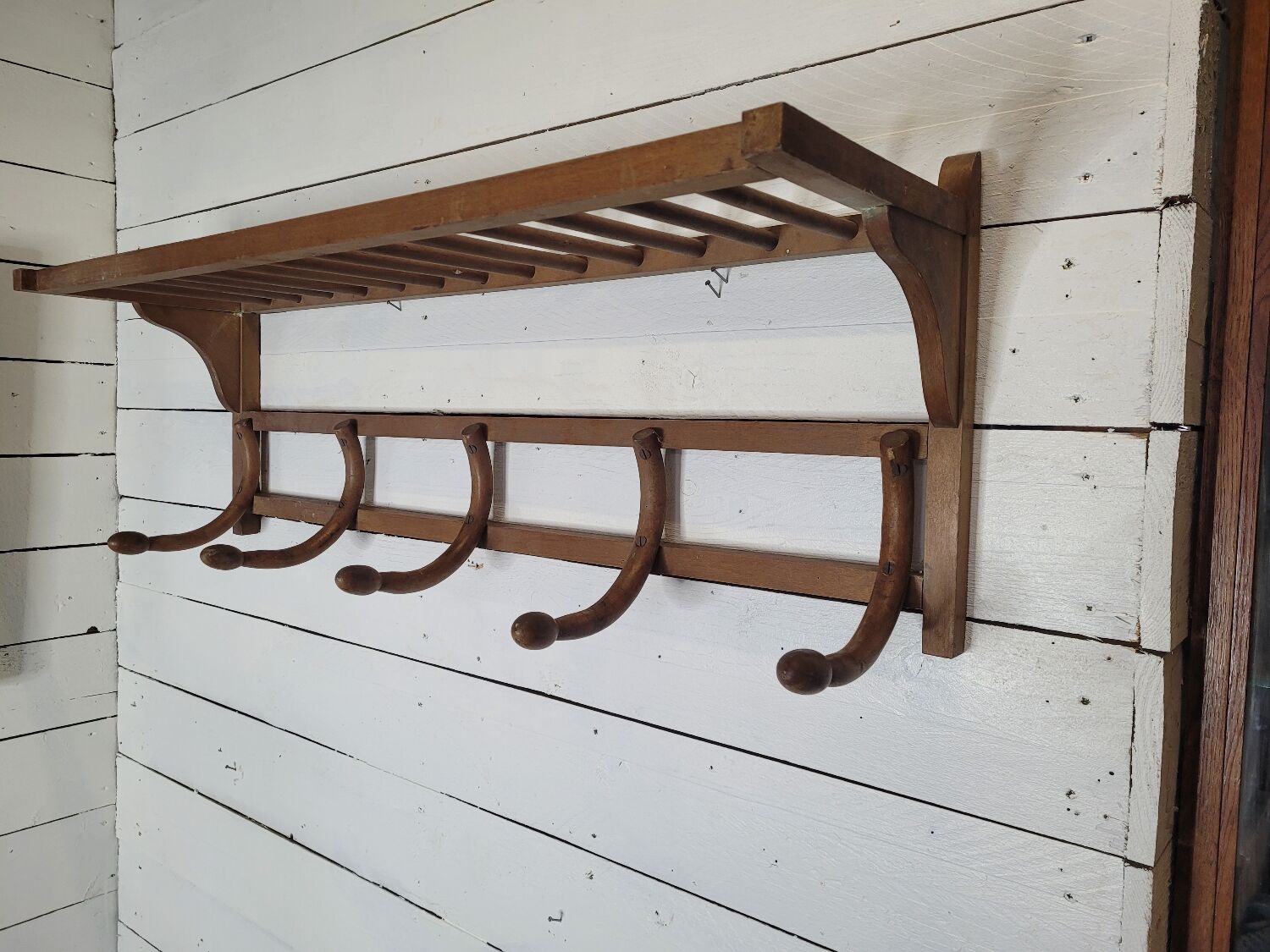 Curved wooden coat rack