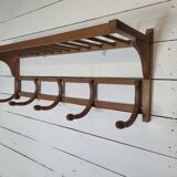 Curved wooden coat rack