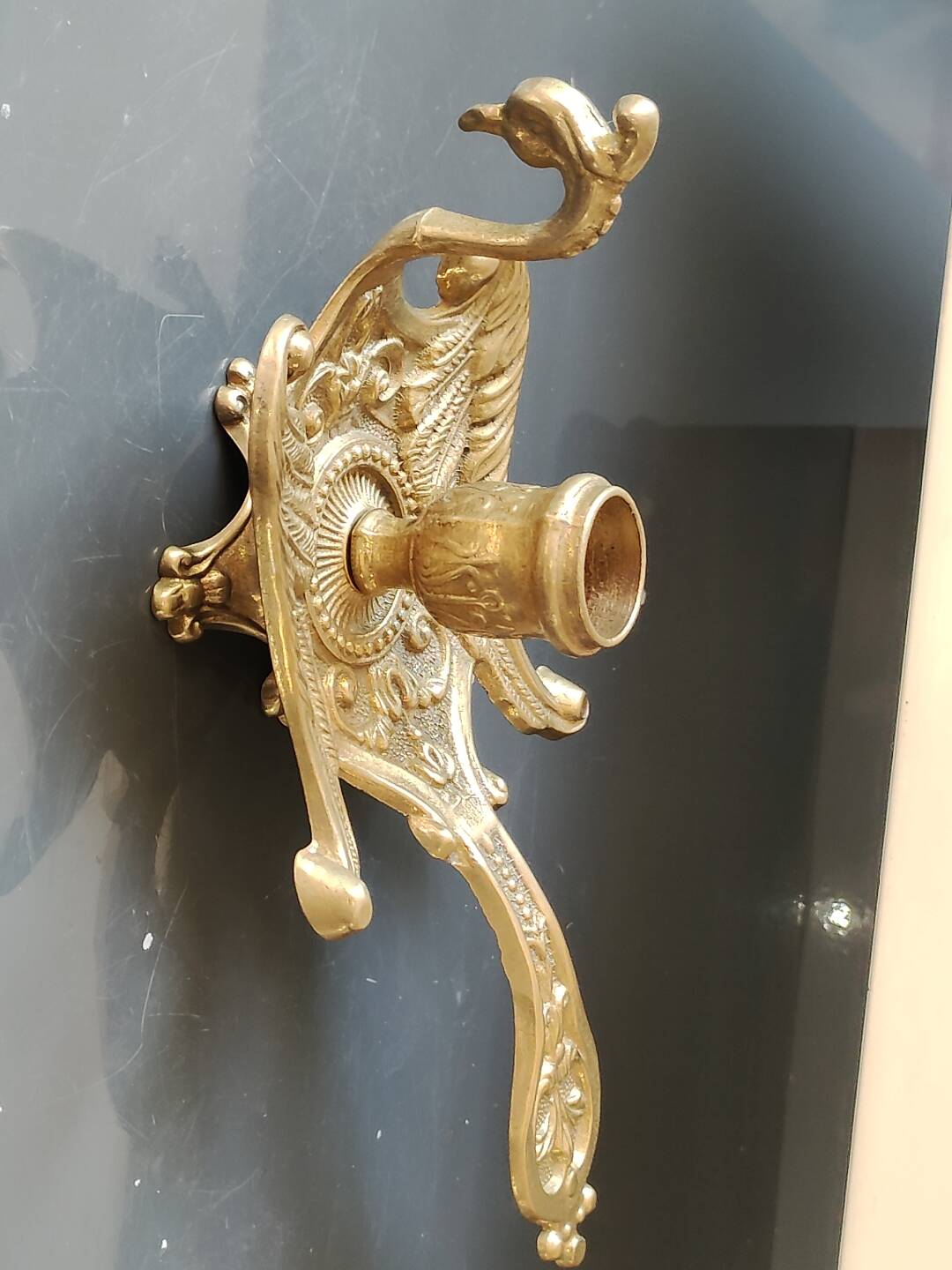 Hand-held bourgeoir/cellar rat, Phoenix/Peacock, in brass. Art Nouveau style
