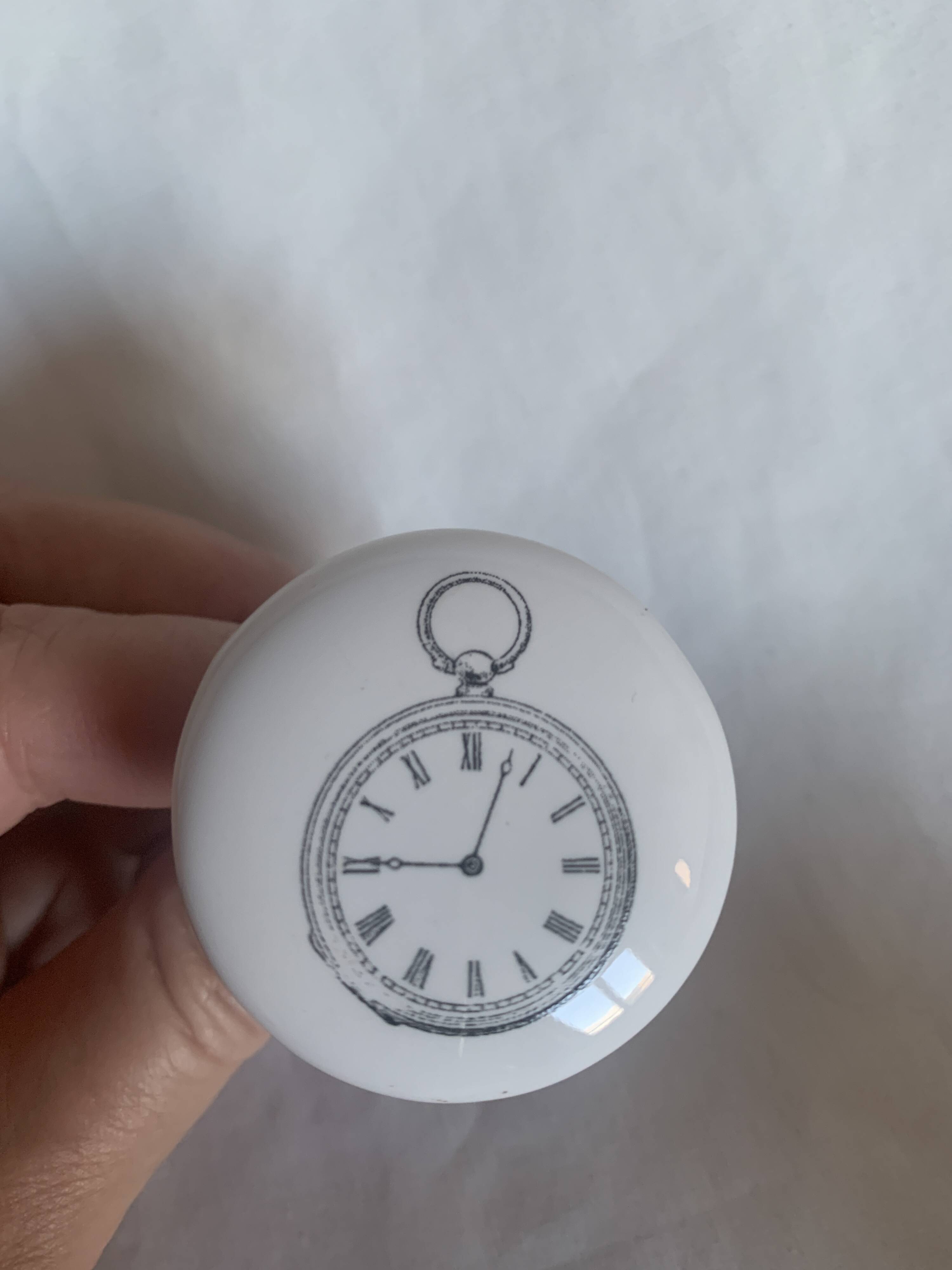 white ceramic door knobs with illustration