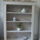 Old patinated pearl gray library, wooden top, composed of 3 adjustable shelves.