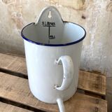 Old white and blue enamelled enema pot