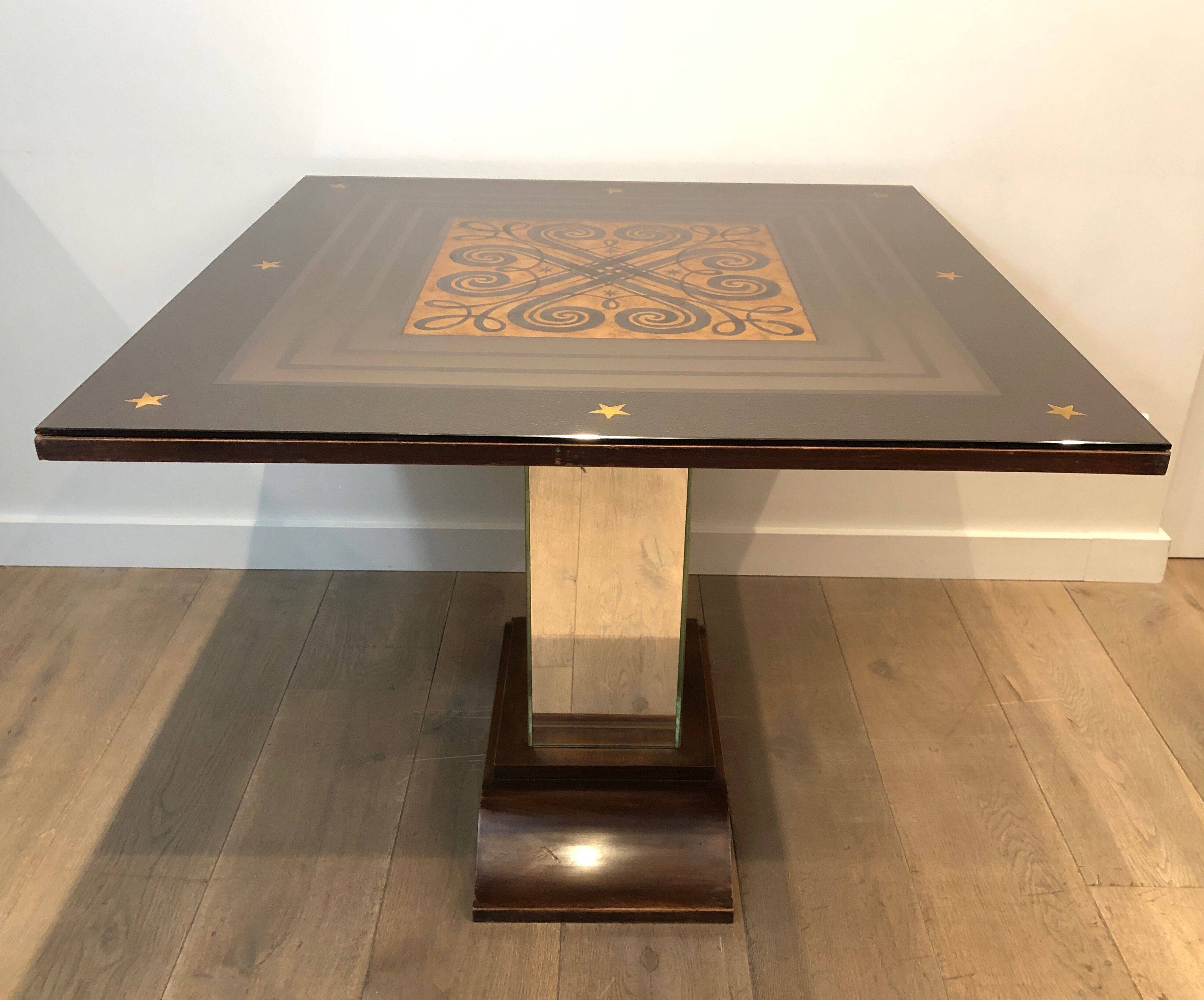 Art Deco centre table with a mirrored eglomisé top in the style of Jules Leleu and Max Ingrand.