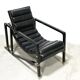 Black leather chaise longue, Eileen Gray design, 1927, France, circa 1975.