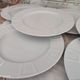 Set of 7 flat plates in white Limoges porcelain geometric decoration in relief