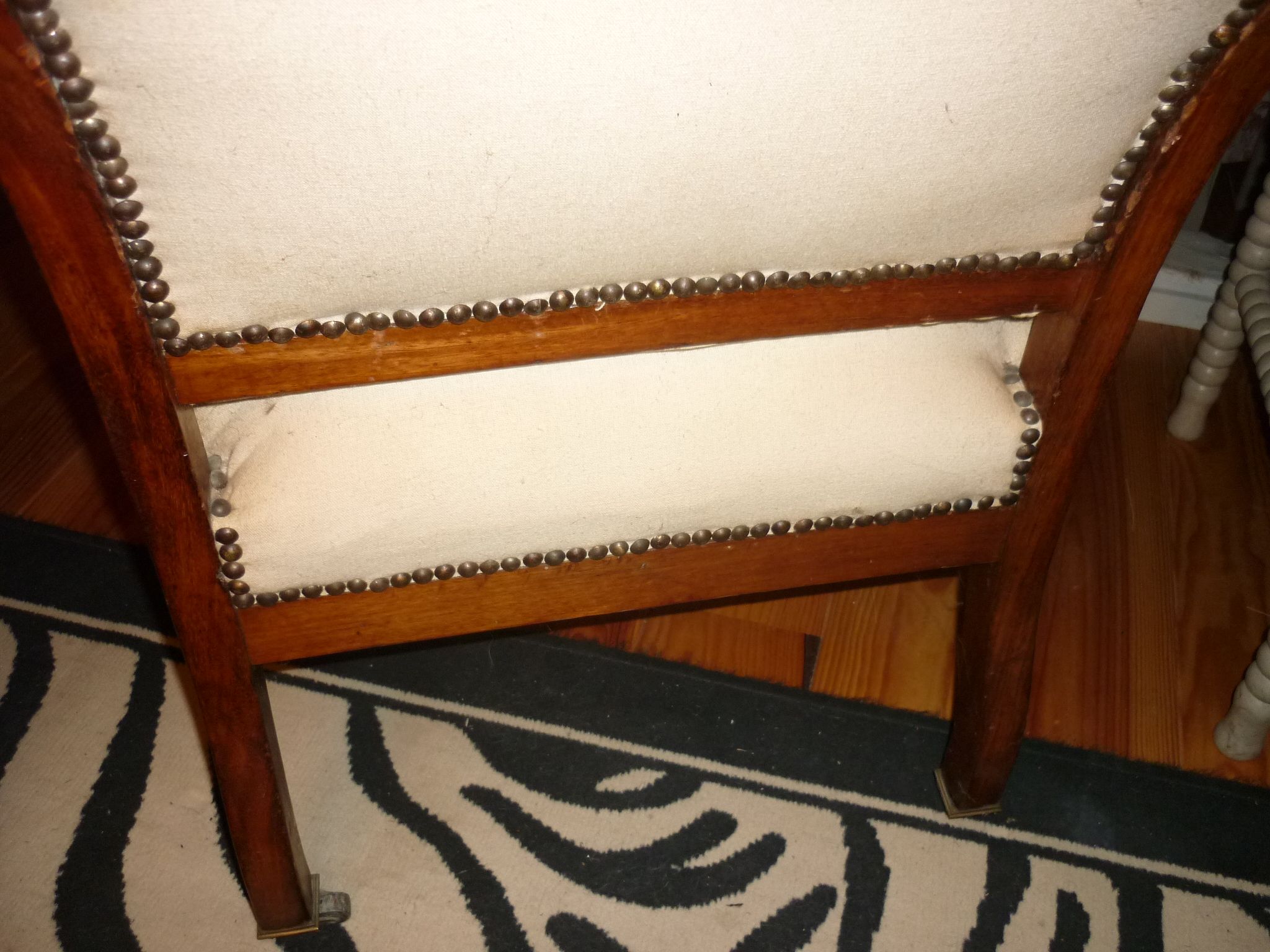 Armchair and its footrest