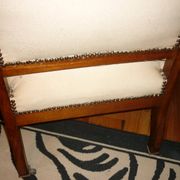 Armchair and its footrest