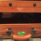 Thick leather suitcase