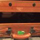 Thick leather suitcase