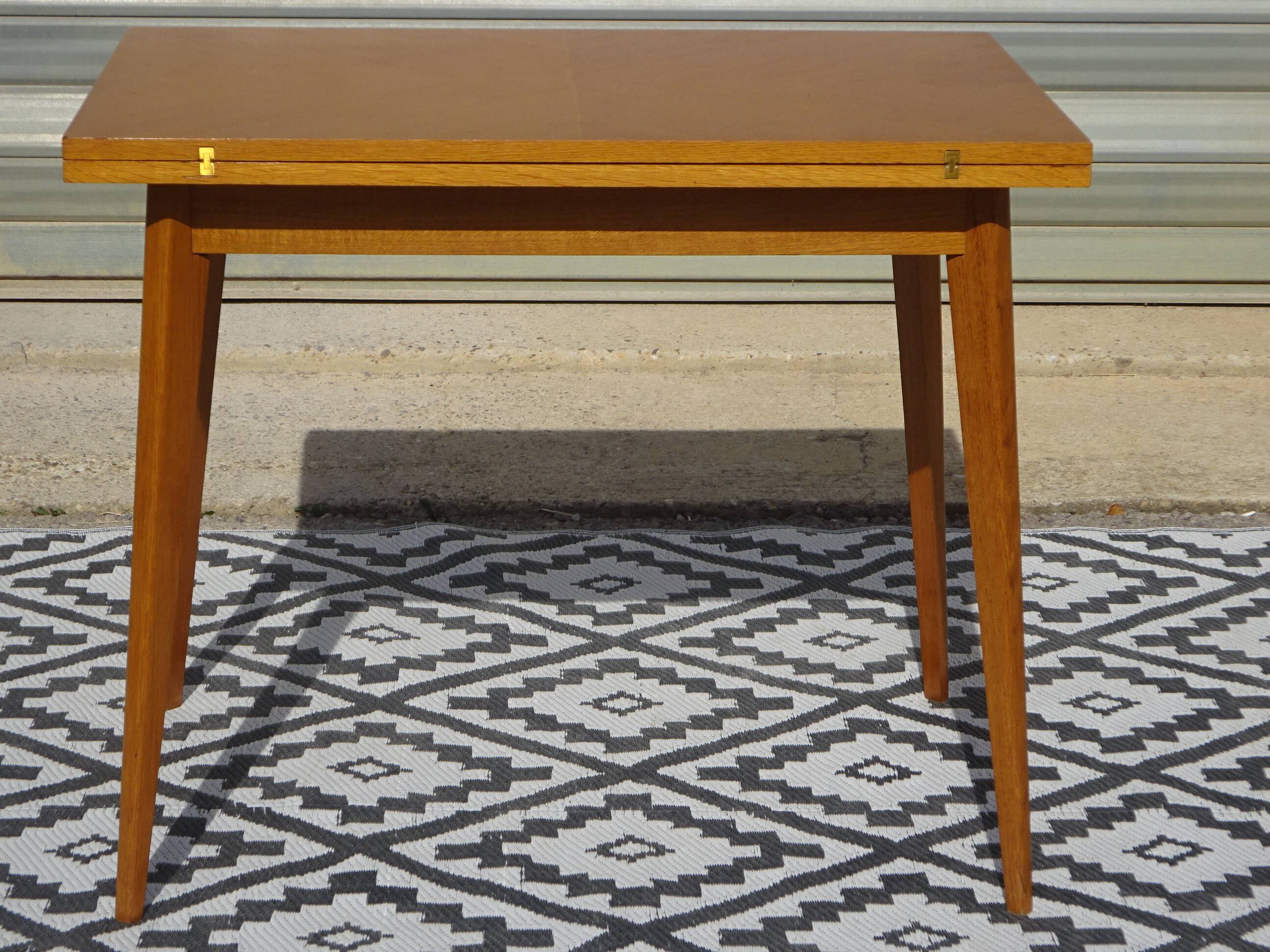 Scandinavian portfolio table model "half-century" by SAM