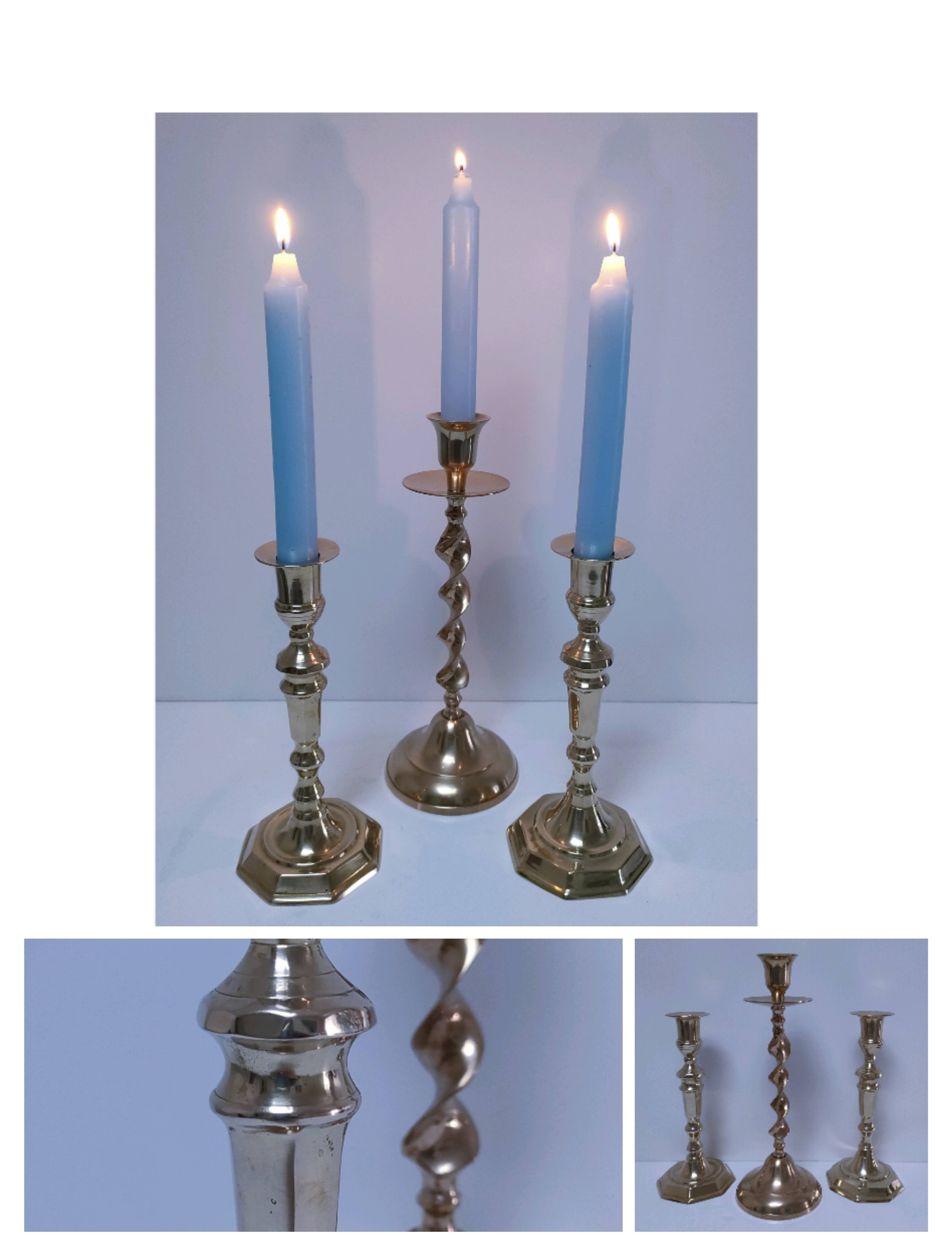 Three vintage solid brass candle holders