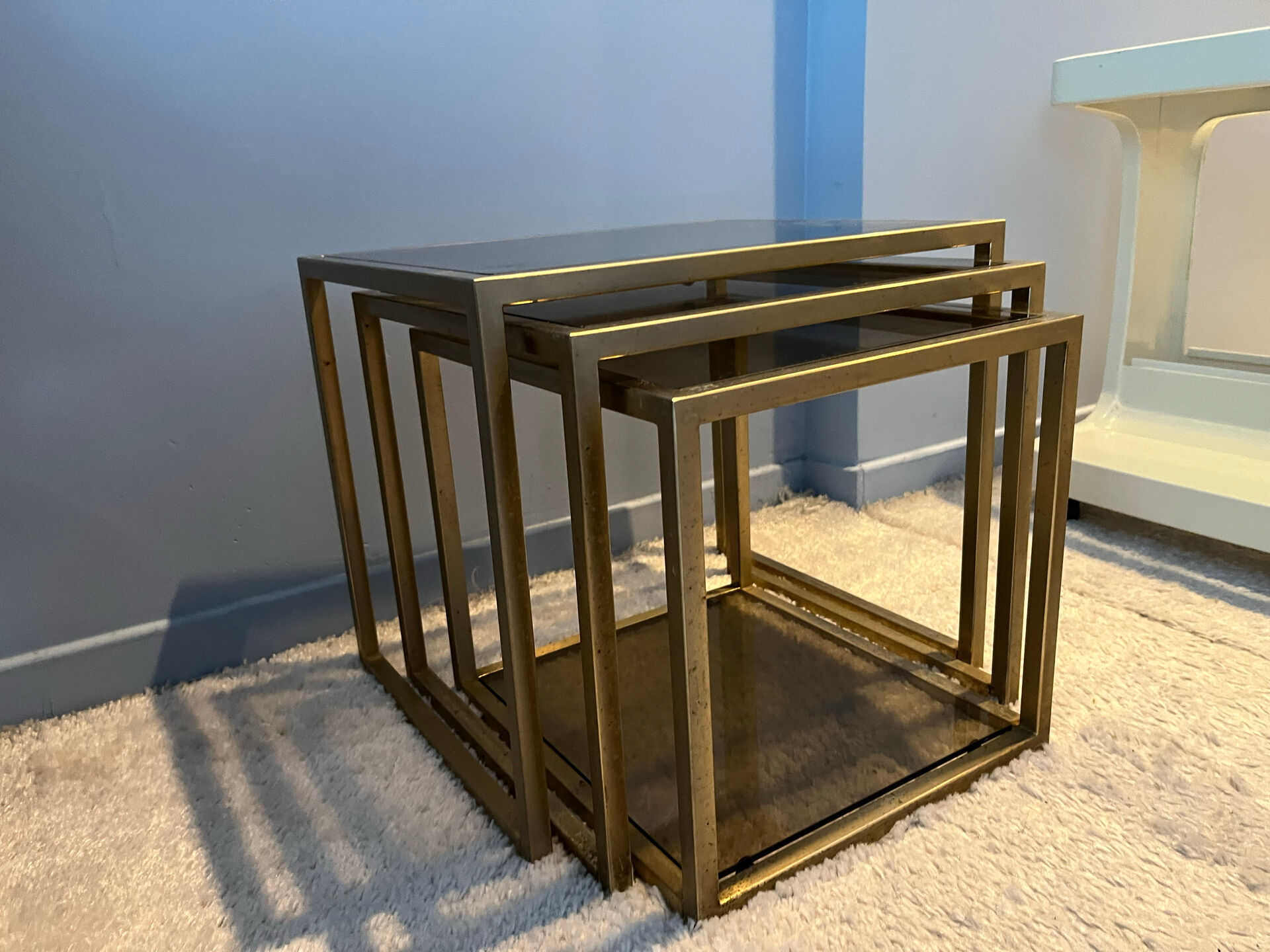 3 nesting tables in the style of Jansen.