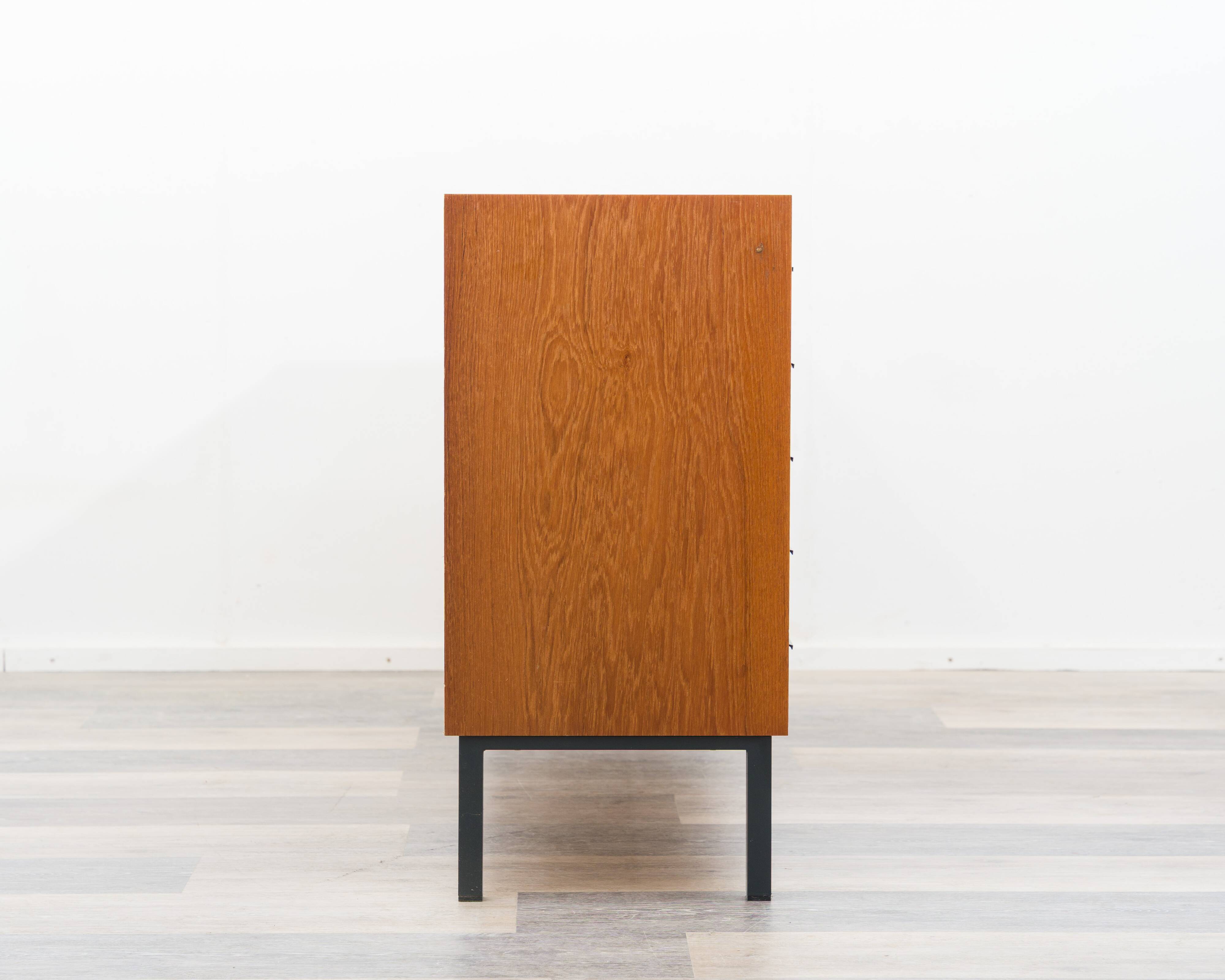 Teak sideboard with grooved drawers, 1960s.
