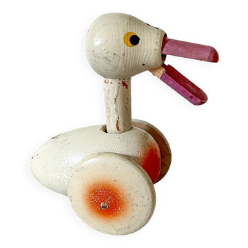 Ancien jouet à pousser, canard en bois