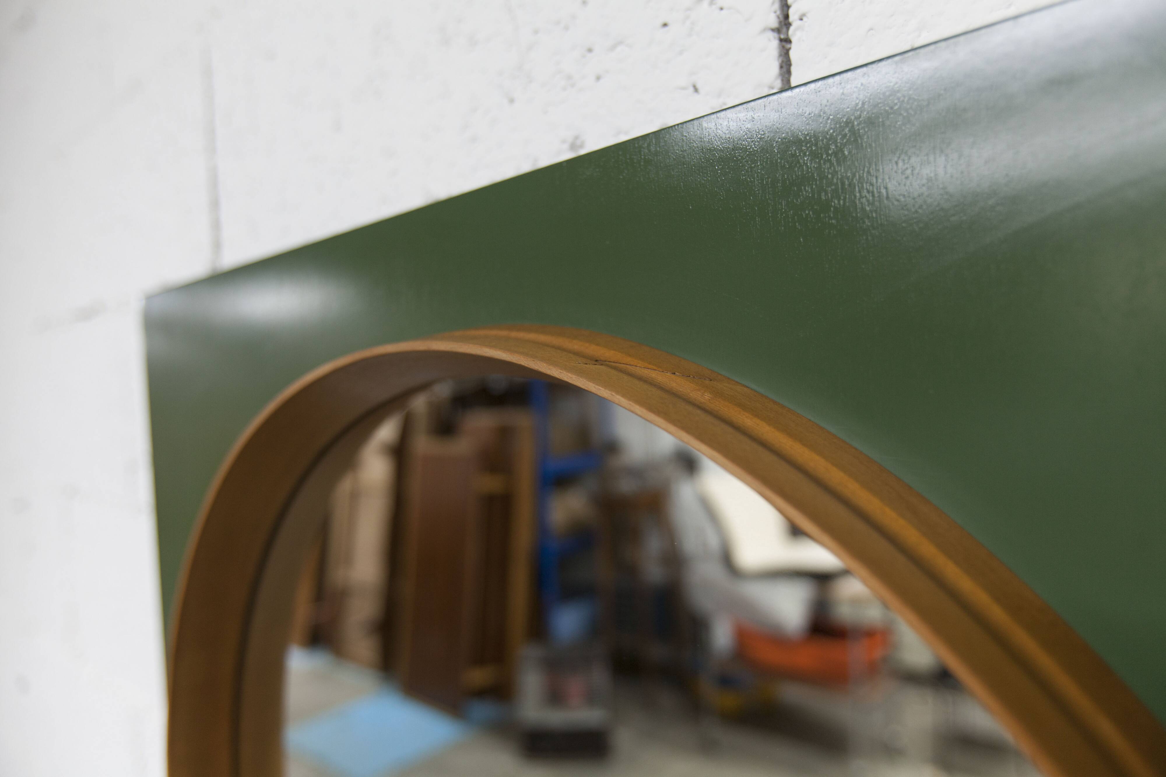 Unusual round wall mirror 60 cm teak edge on green rectangular board 1960.