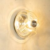 Sculptural wave wall lamp made of structured solid glass by peill & putzler