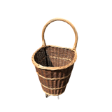 Vintage wicker log basket on wheels