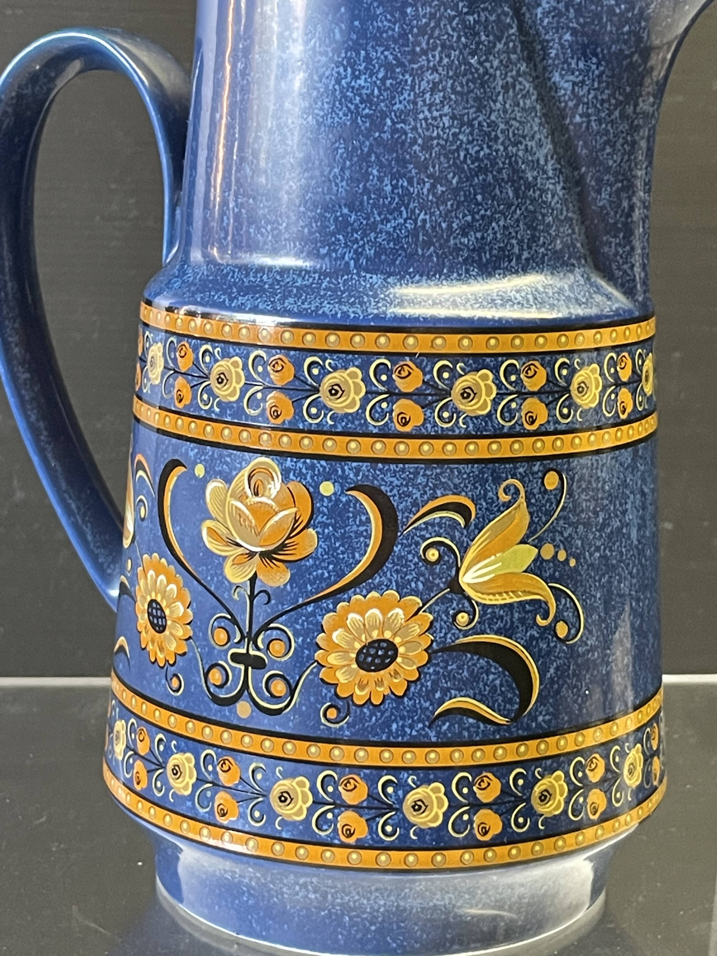 Very nice blue ceramic jug in good condition.