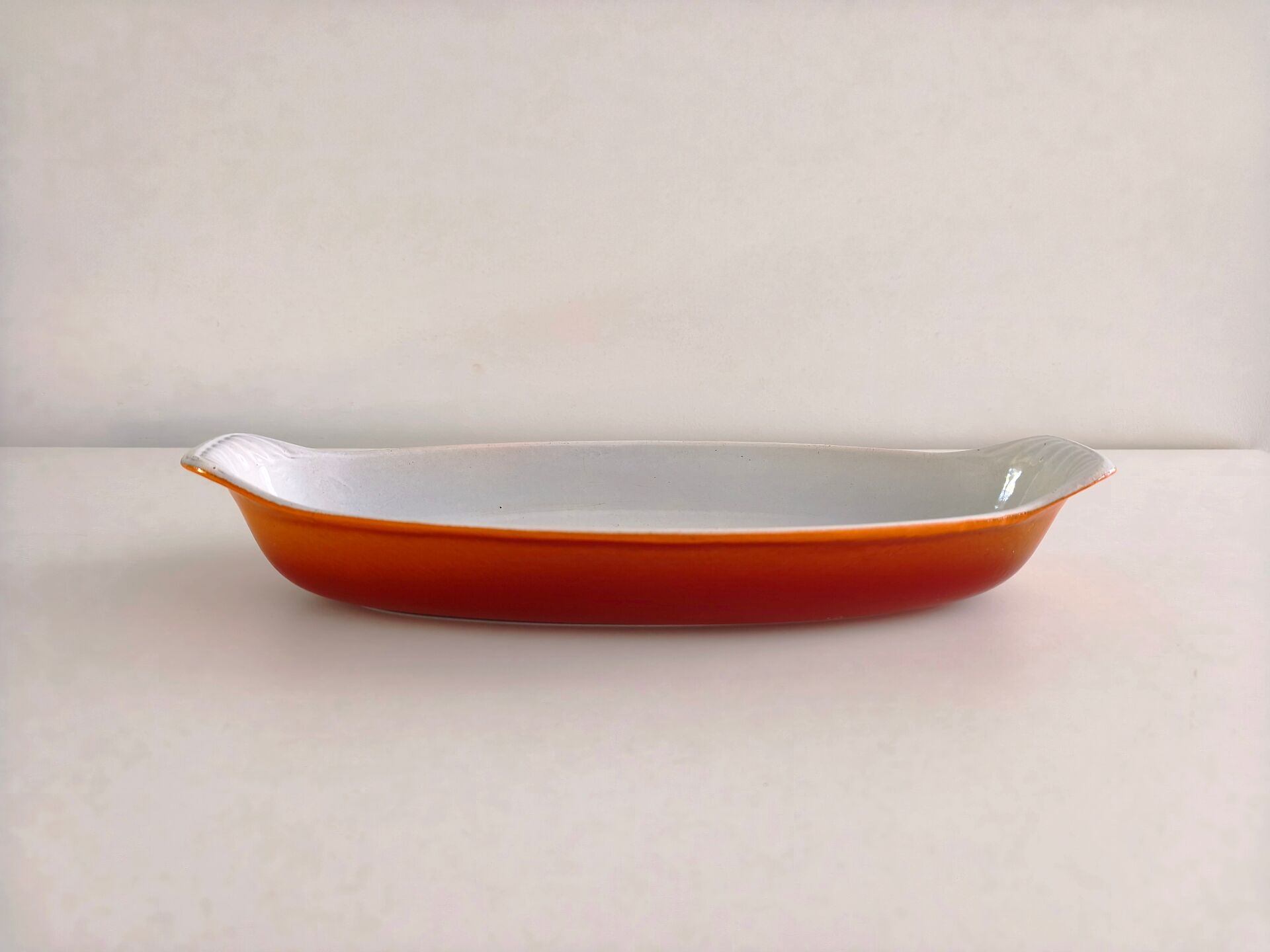 Enamelled cast iron baking dish of the Le Creuset type.