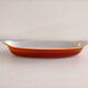 Enamelled cast iron baking dish of the Le Creuset type.
