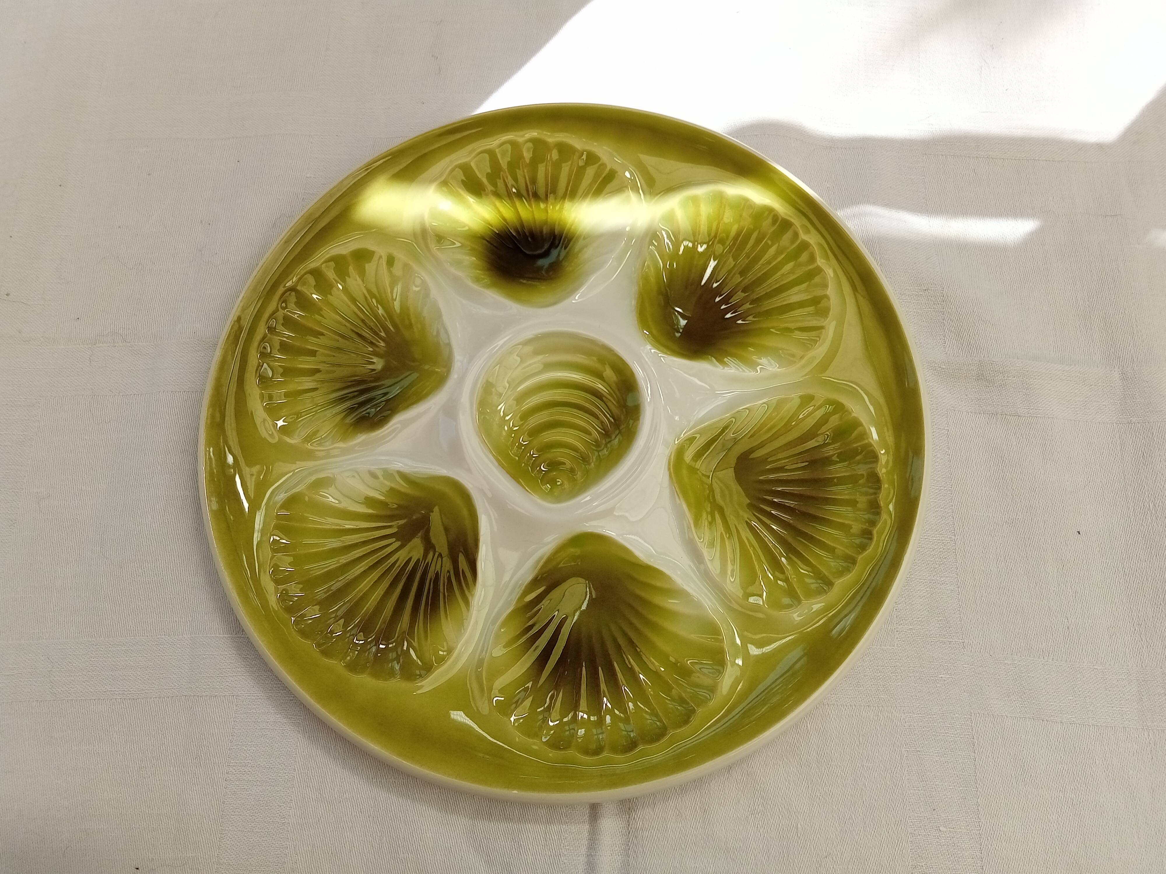 12 oyster plates and Moulin des loups dish