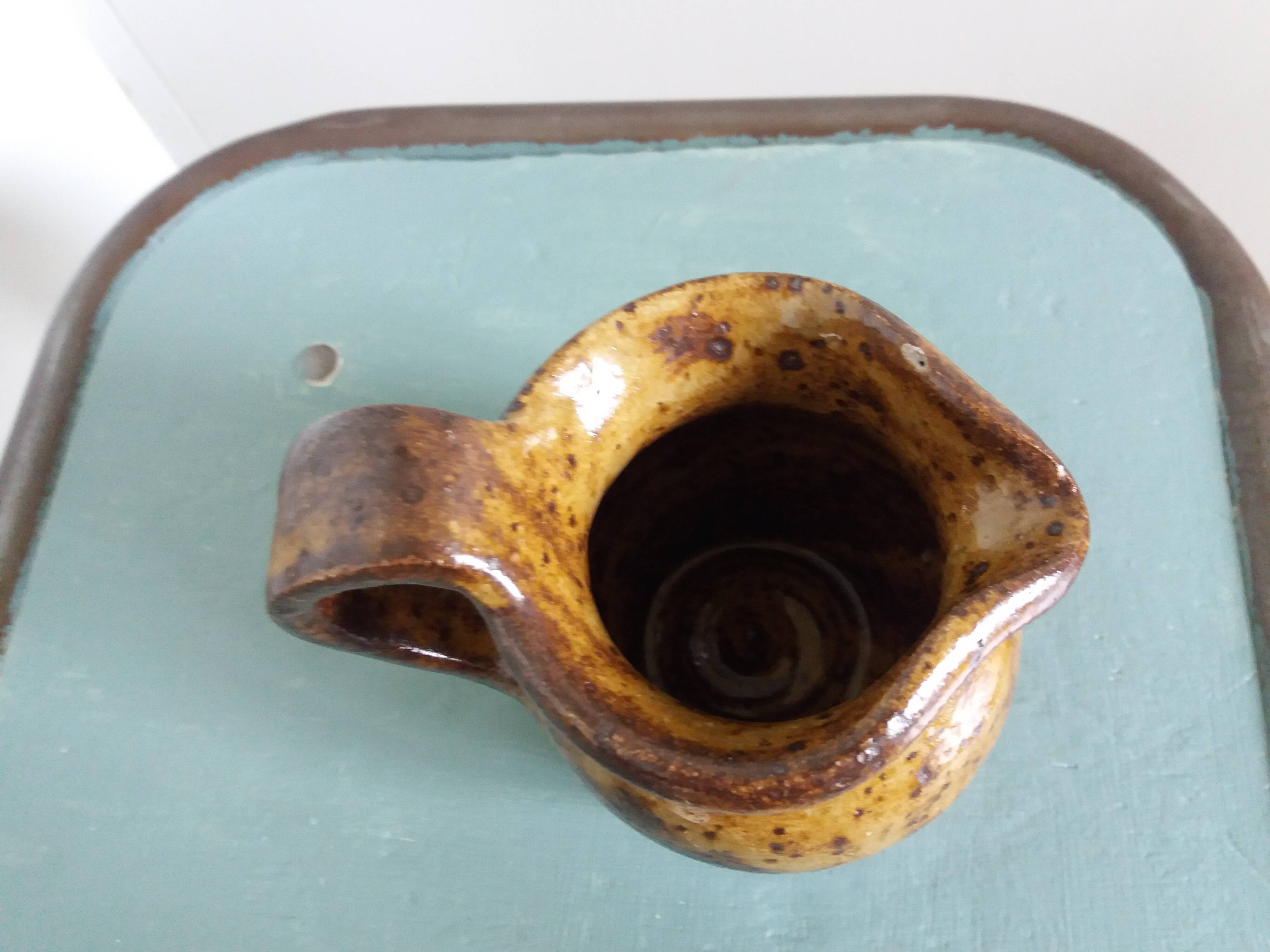 Stoneware pitcher signed cg