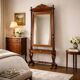 Antique Louis-Philippe mirror in carved walnut, Italy, 19th century.