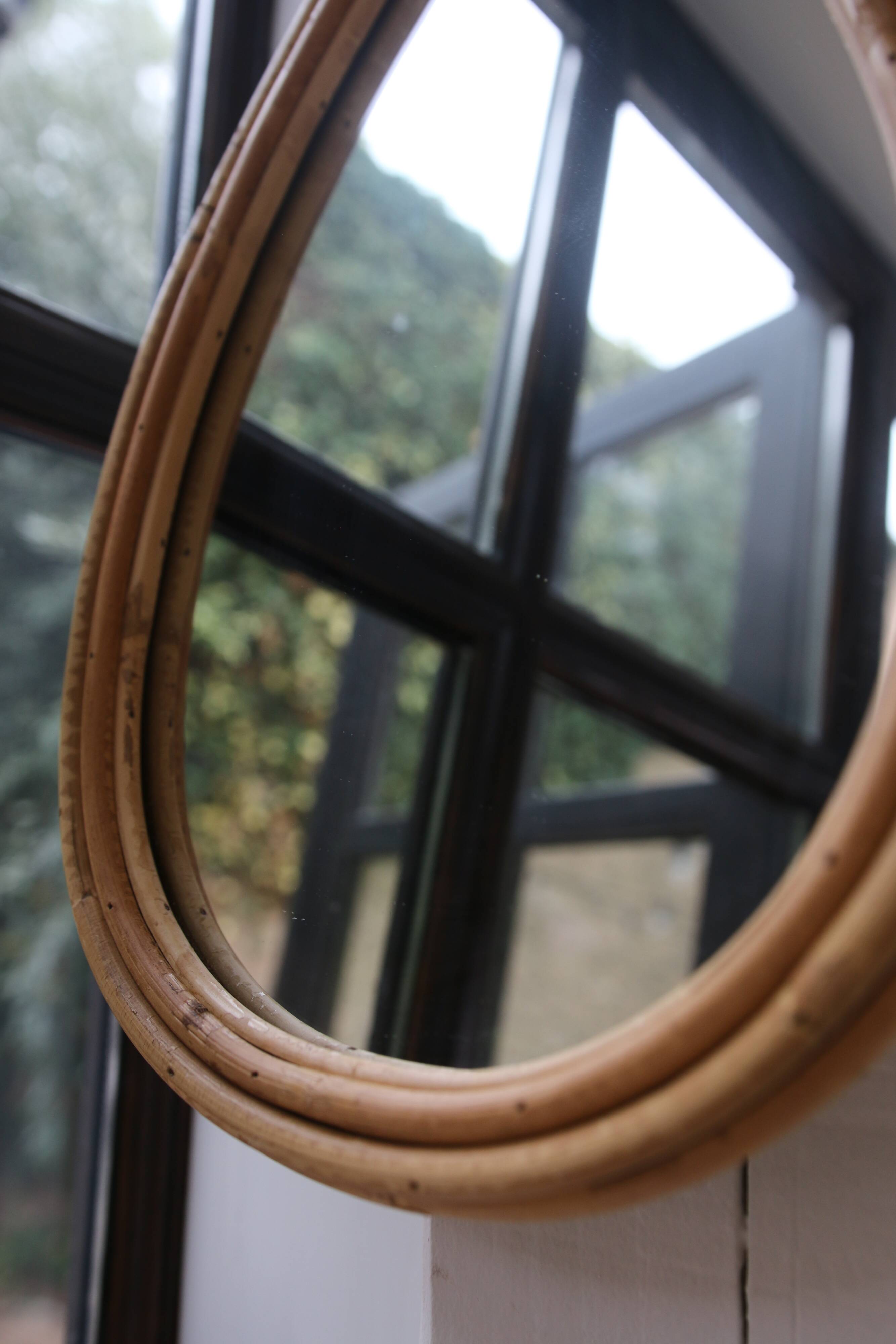 Vintage teardrop rattan mirror