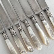 Antique table knives in mother-of-pearl and silver-plated metal
