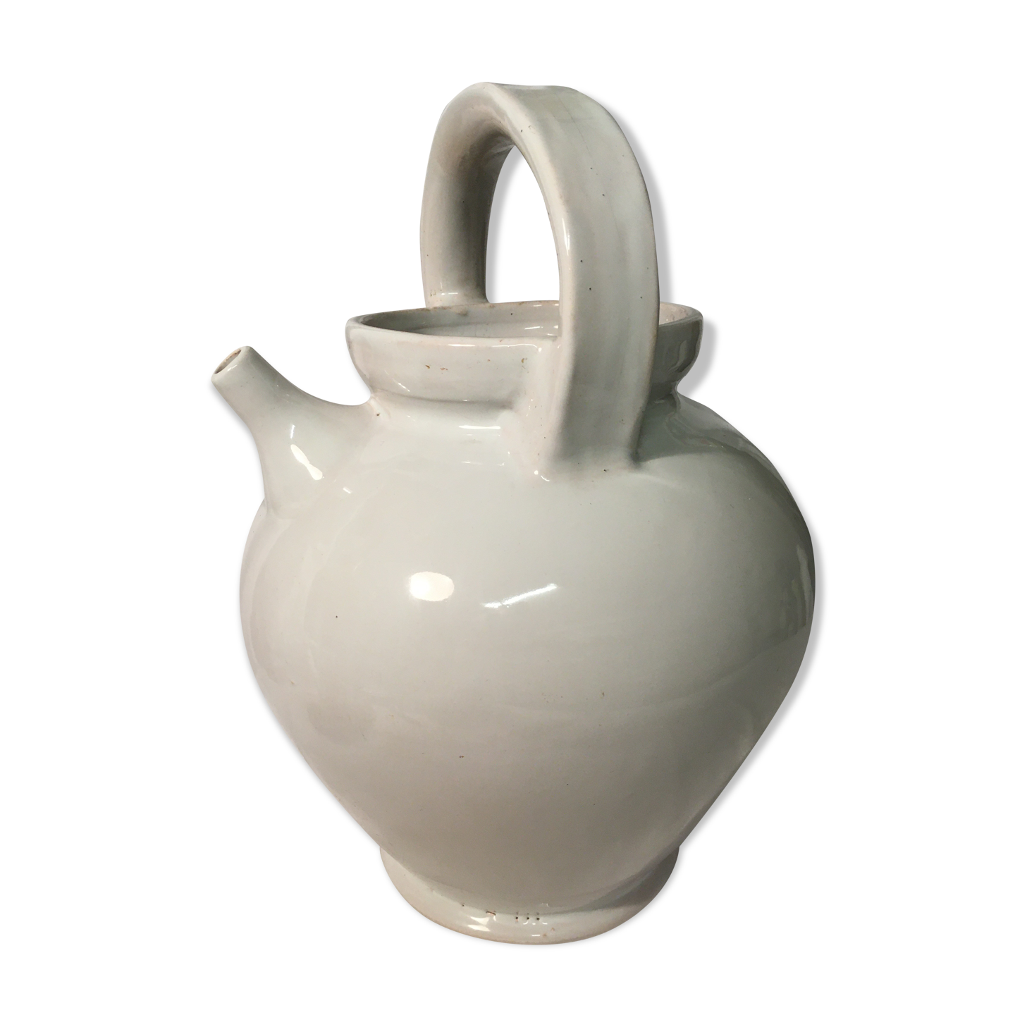 Old chevrette / pitcher in white earthenware