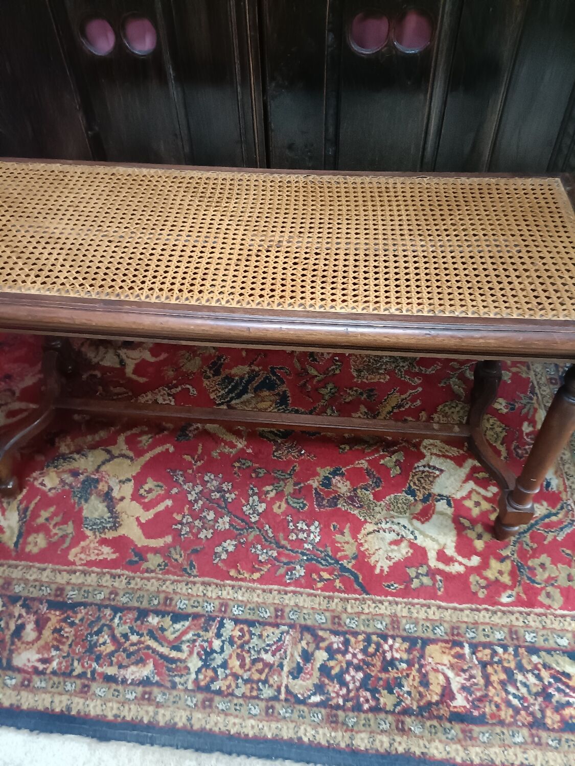 Wooden bench or piano bench with tanned seat