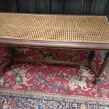 Wooden bench or piano bench with tanned seat