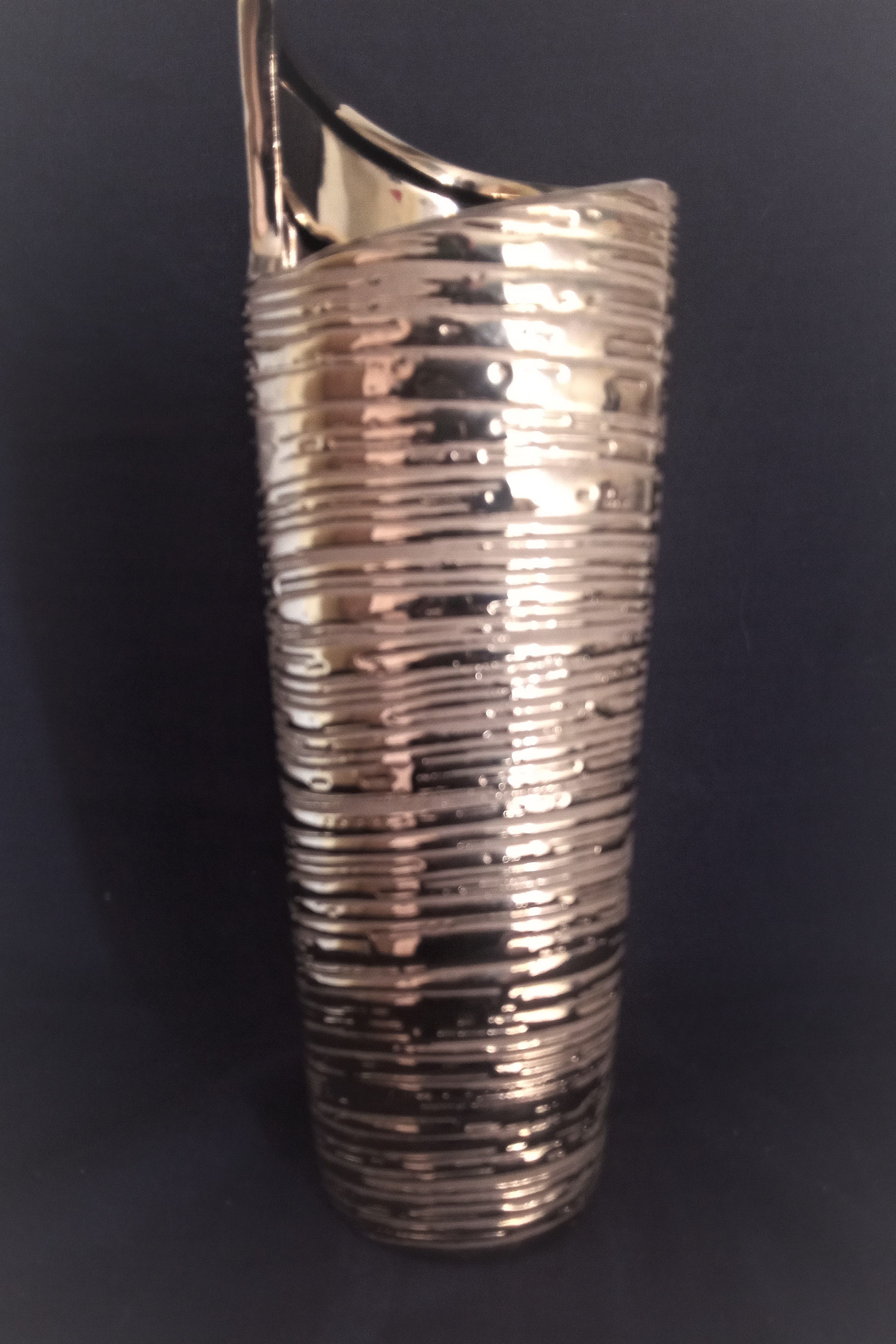 Cubist vase in gilded and ridged ceramic