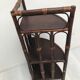 Rattan angle shelf at 3 levels 70's