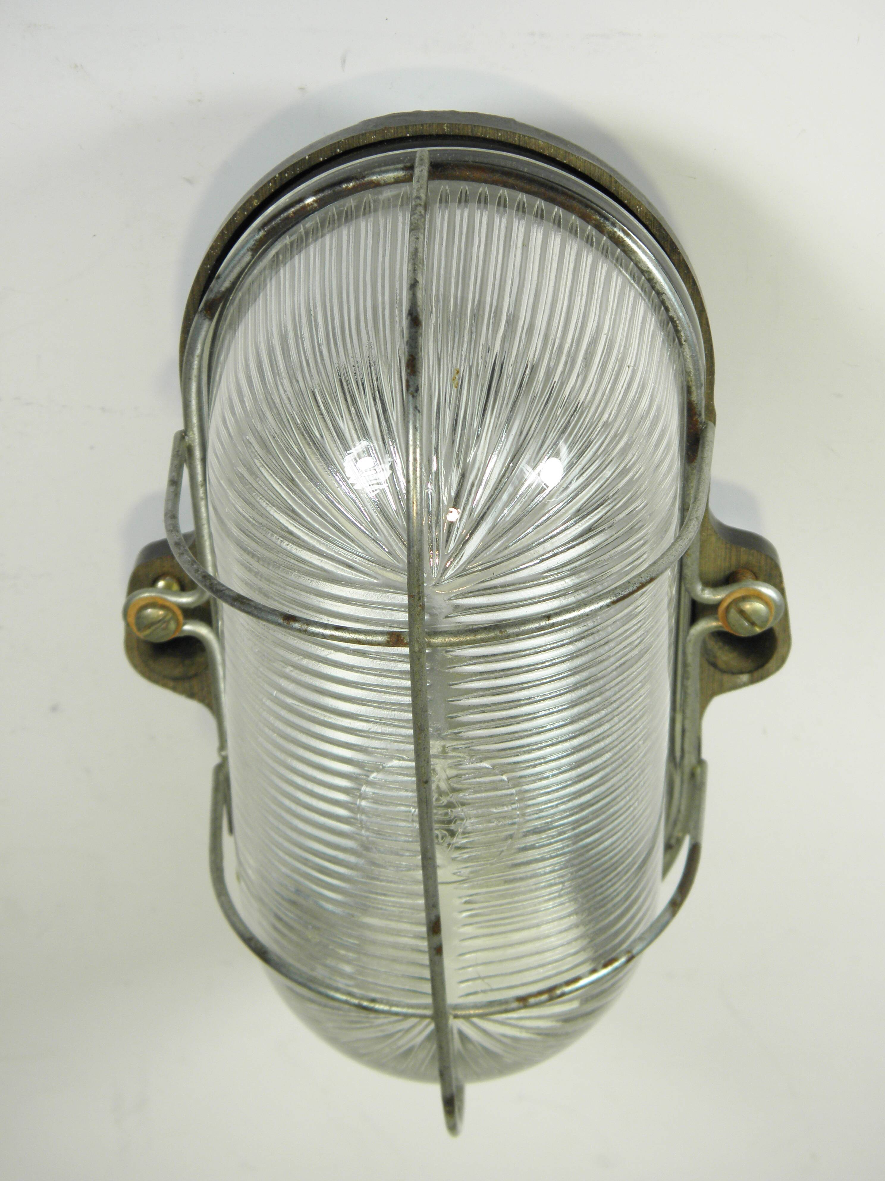 Glass and Bakelite wall light from the 1950s.